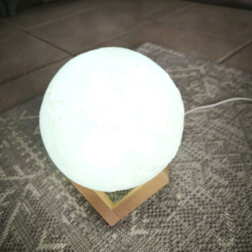 Table lamp used with wooden base and 3 lighting shades