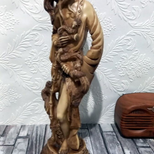 Decorative tabletop statue of Asian man like new