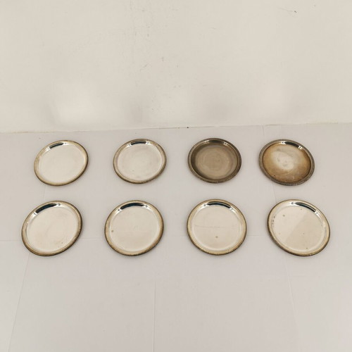 Set of 8 used metal coasters