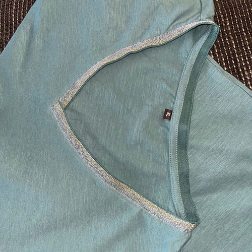 T-shirt with V-neck and silver detail, like new, turquoise