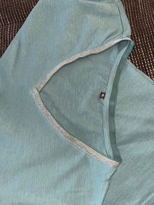 T-shirt with V-neck and silver detail, like new, turquoise