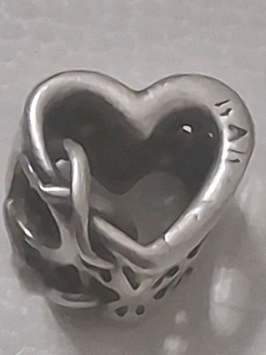 Pandora charm heart with infinity symbol like new, silver