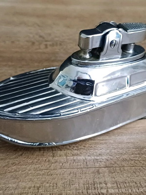 Petrol lighter used, yacht-shaped table model