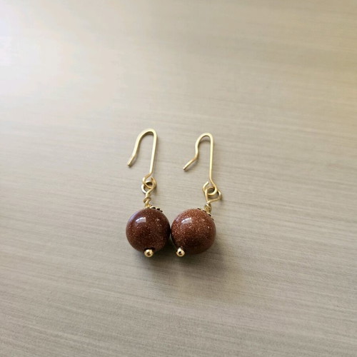 Handmade dangle earrings with goldstone