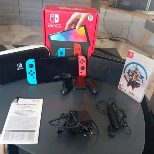 Nintendo Switch OLED like new with Mortal Kombat game
