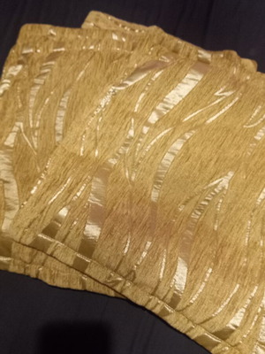 Throws 3 in golden shades and 5 cushion covers like new