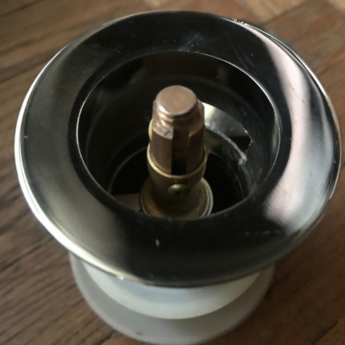 Brass mushroom sink valve used with two caps