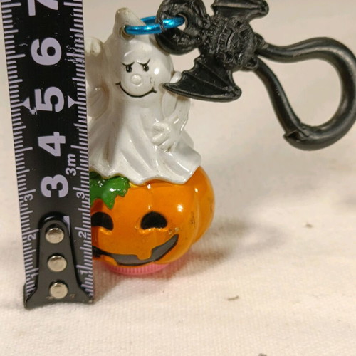 Halloween vintage keychain and scraper used