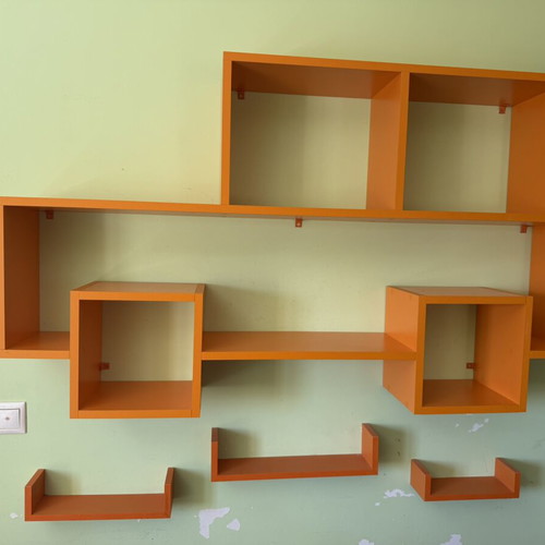 Modern orange wall shelf unit for kids or office