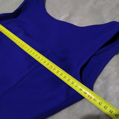 blue dress with an opening at the back