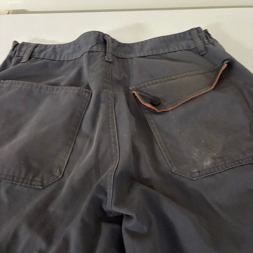 Panoply work coverall size L used with small tear