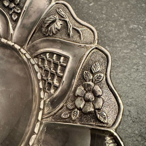 Vintage bowl with silver lining and engraved design, used