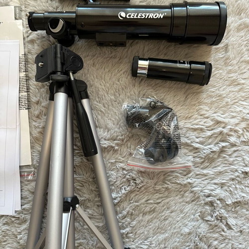 Celestron telescope new with equipment and accessories