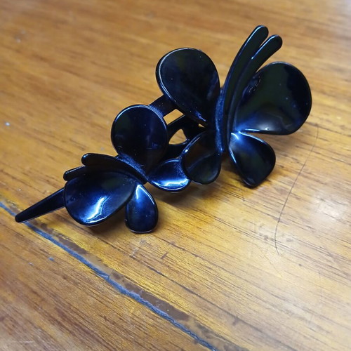Hair clip plastic black with butterflies used