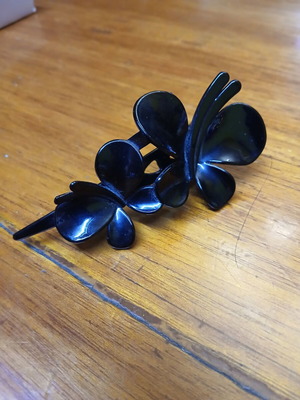 Hair clip plastic black with butterflies used