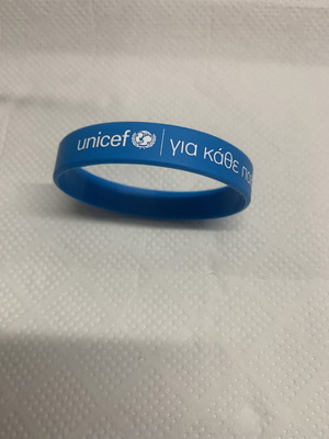 Unicef bracelet new, blue rubber with message