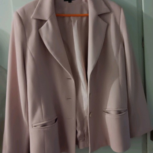 Kanellis Collection soft pink jacket used with wear