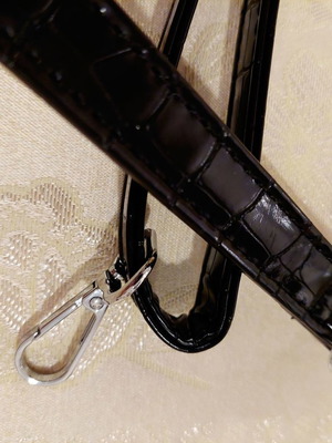Black bag strap with silver clasps like new
