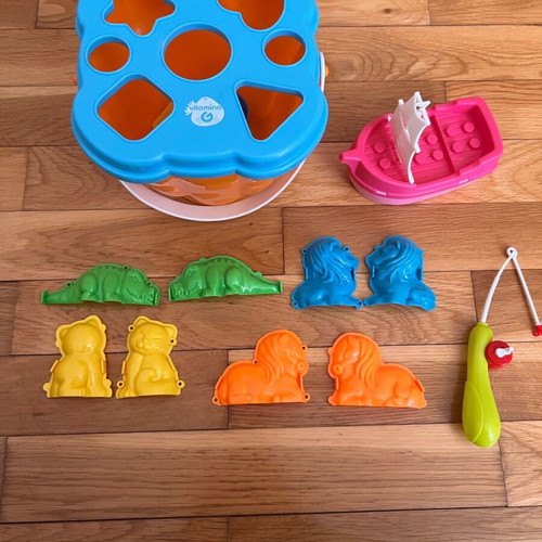 Beach bucket with shape sorting toy used