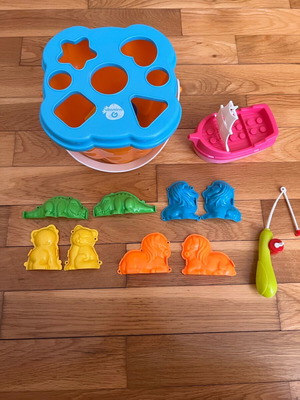 Beach bucket with shape sorting toy used