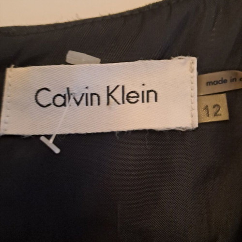Calvin Klein dress gray size 12 like new with V-neck and ruffle