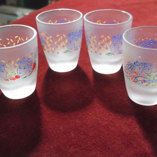 Collectible shot glasses set of 4 designed by G. Stathopoulos like new