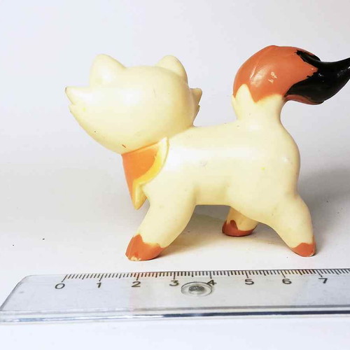 Sagwa plastic figure used with scratches and marks