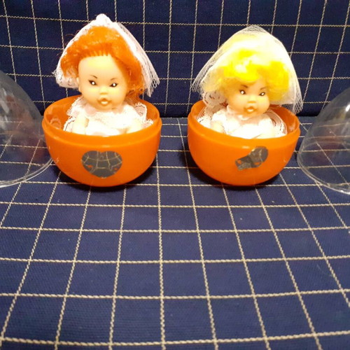 Small dolls in egg new