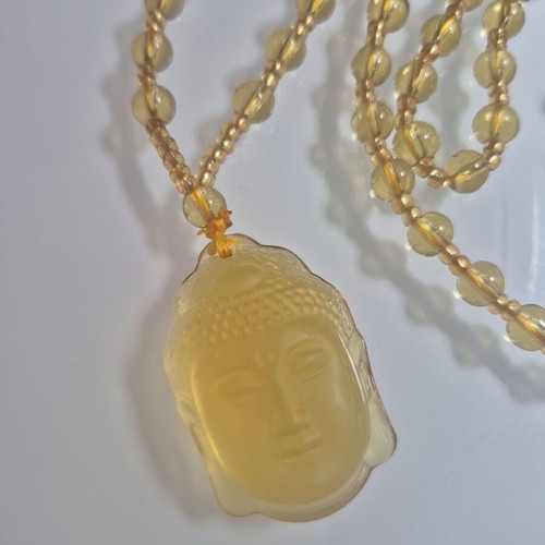 Buddha Necklace new, yellow sun color