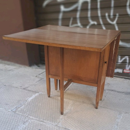 Dining table used with 2 drop-leaves and cabinet with shelf