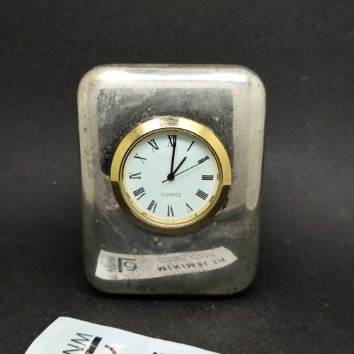 Metal analog desk clock used, 90s style