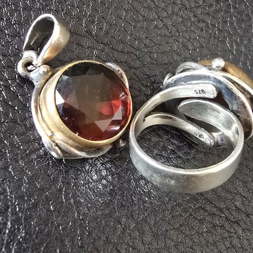 Women's silver ring and pendant set like new