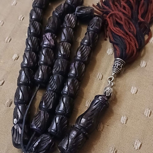 Komboloi bone engraved worry beads used with metal elements and tassel