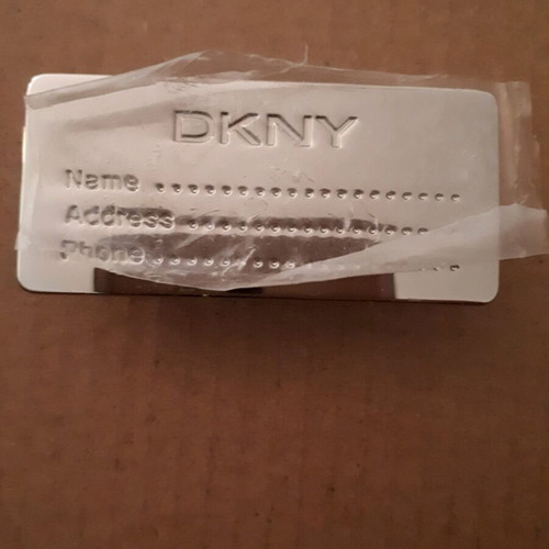 DKNY bag tag with plastic protective cover