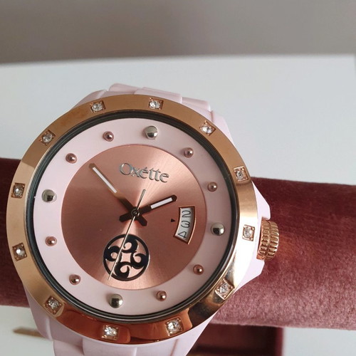 Oxette pink women's watch with rubber strap and pink gold dial like new