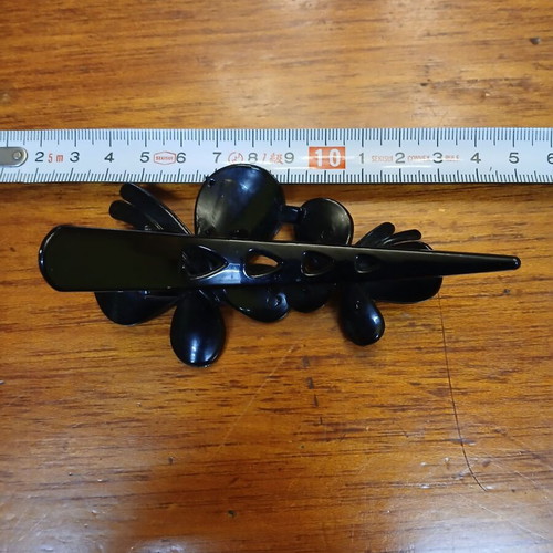 Hair clip plastic black with butterflies used