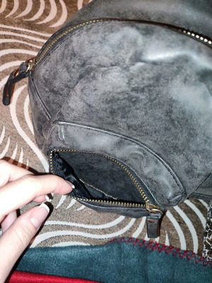 Small backpack used with small and large pocket