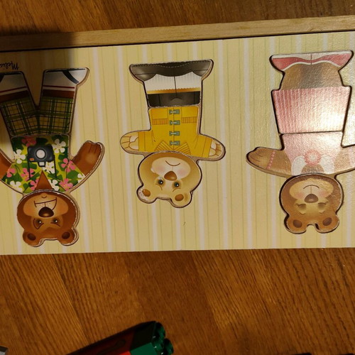 Melissa and Doug wooden puzzle like new with 3 figures and clothes