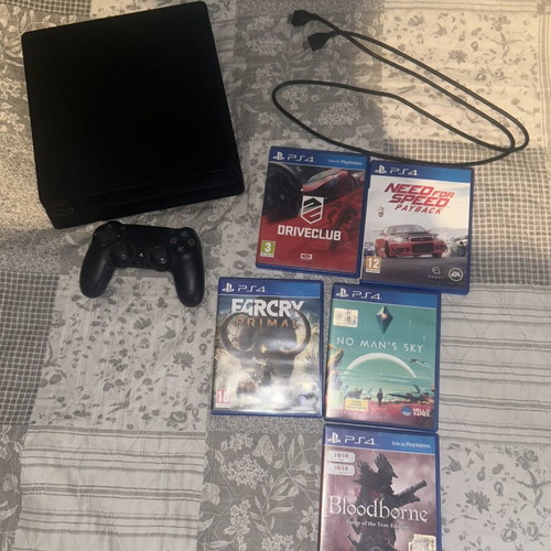 PlayStation 4 console with games and controller, 500GB