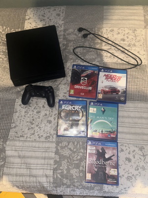 PlayStation 4 console with games and controller, 500GB