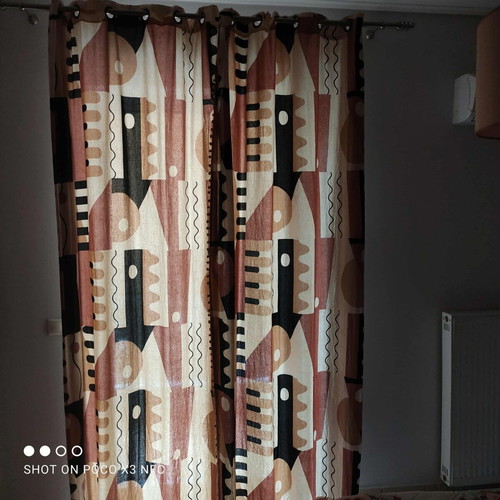 Curtains with grommets like new, two panels 1.40x2.60m each, medium shading