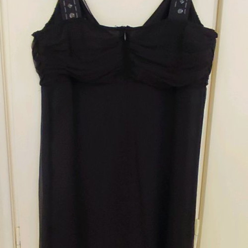 Black blouse with fringes used and black evening dress