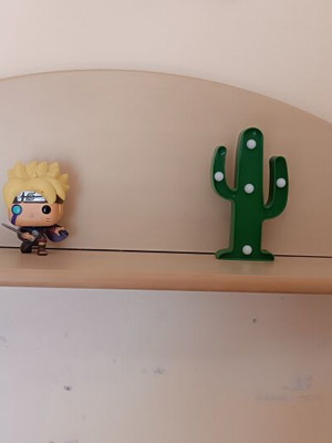 Wooden wall shelf with decorative curved back, for children or teens