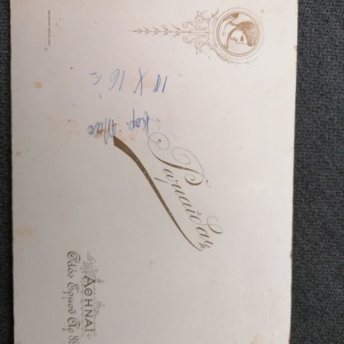 Photograph on thick cardboard used, with damages