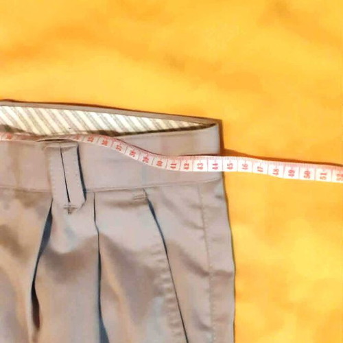 Classic men's fabric pants with pleats beige khaki size 44/46 like new