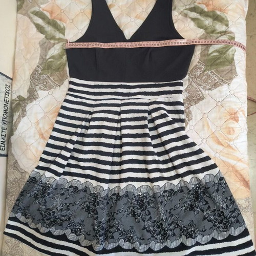 Women's black and white elastic dress size L/XL like new
