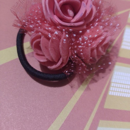 Hair accessory with coral roses