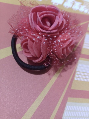 Hair accessory with coral roses