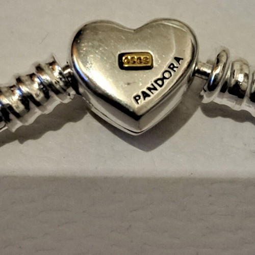 Pandora bracelet size 18, new, heart clasp with gold plating