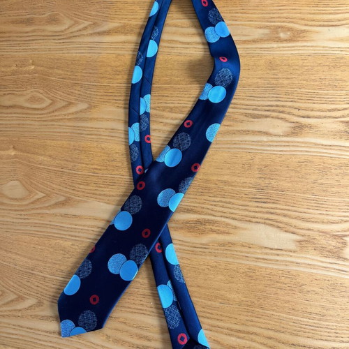 Vintage men's tie blue with geometric polka dots, retro style